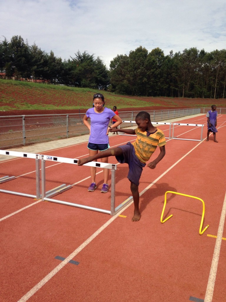 Maddy helping out with hurdles